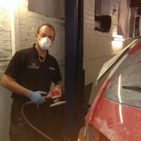 Richard preparing the bodywork on the new loan car