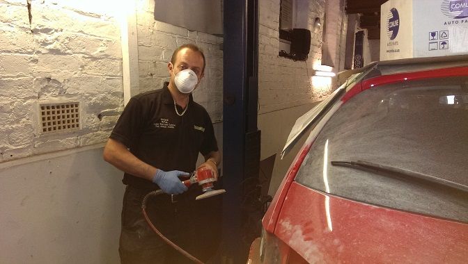 Richard preparing the bodywork on the new loan car